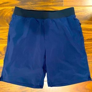 Fabletics shorts with liner. Color blue. Size large.